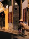 Bicycle lady in the streets of Hoi An.